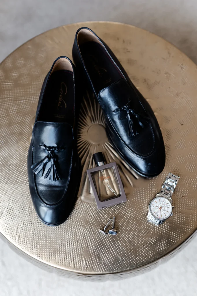 The groom’s shoes, cologne and watch, La Villa Hotel, Mombaruzzo