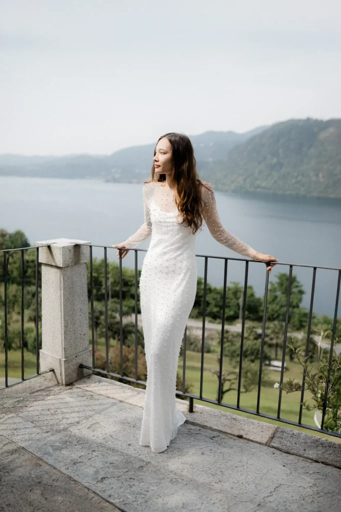 The bride on a terrace overlooking the lake