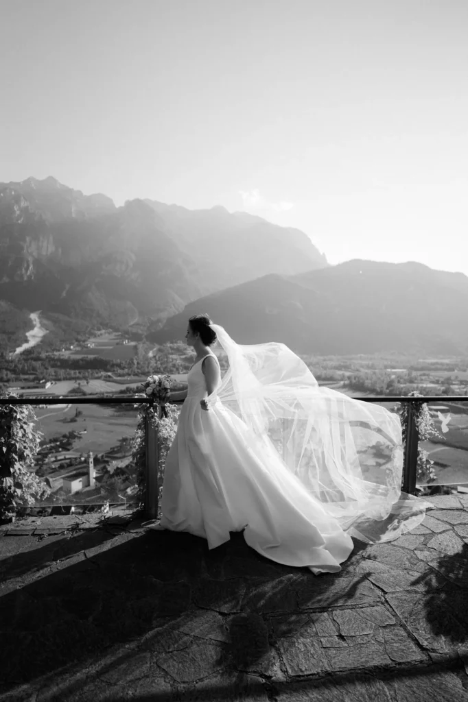 The bride’s veil in the wind against the mountains, Castel Pergine