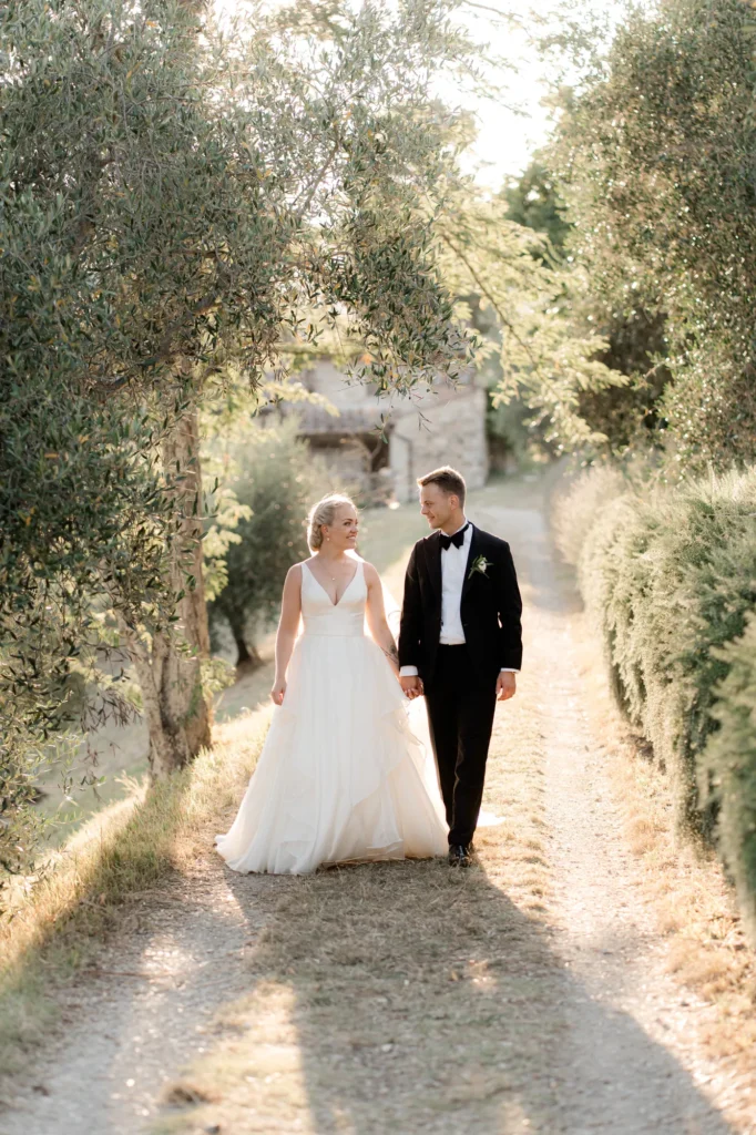 The couple on an olive-lined path, Castello del Trebbio